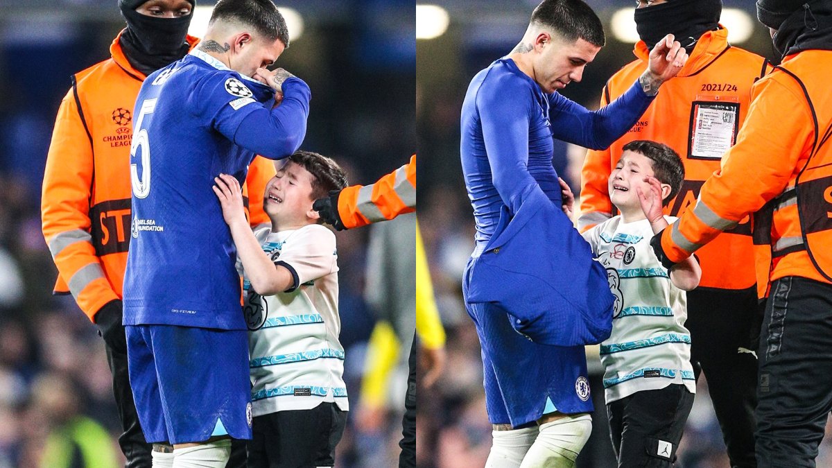 Enzo Fernández obsequia a un niño su camiseta, que rompe en llanto de emoción