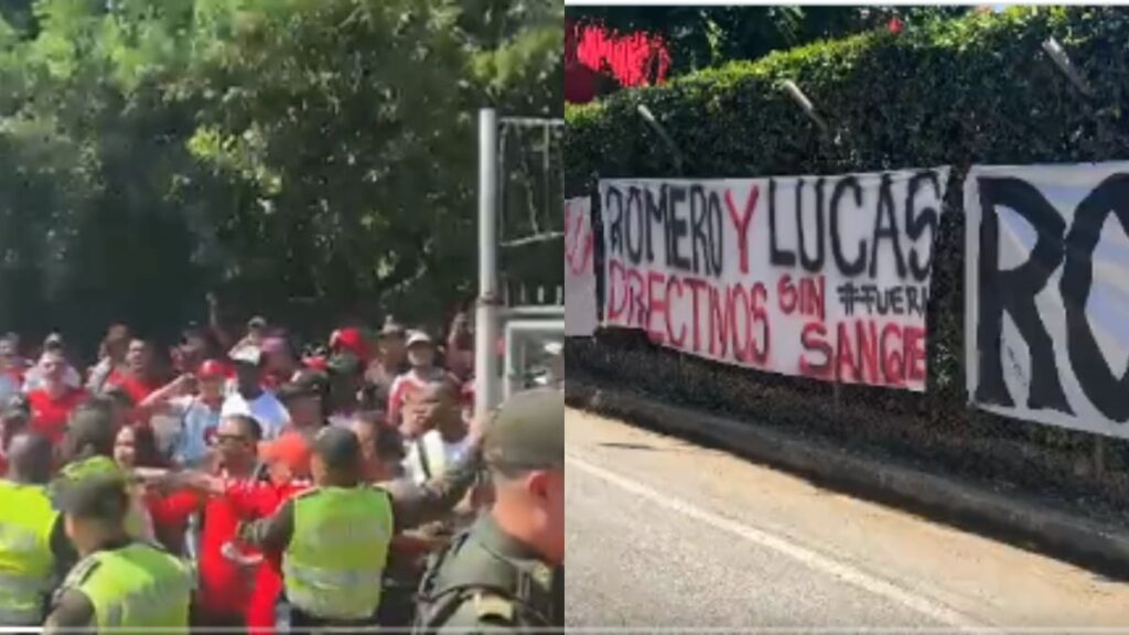 Hinchas del América protestando por continuidad de González.