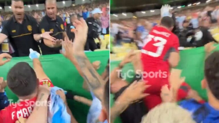Dibu Martínez intenta saltar hacia la tribuna para defender a los aficionados argentinos agredidos