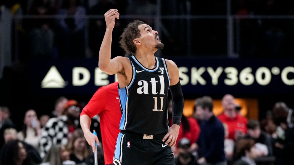 Trae Young y su gesto de dinero a la tribuna | Dale Zanine-USA TODAY Sports