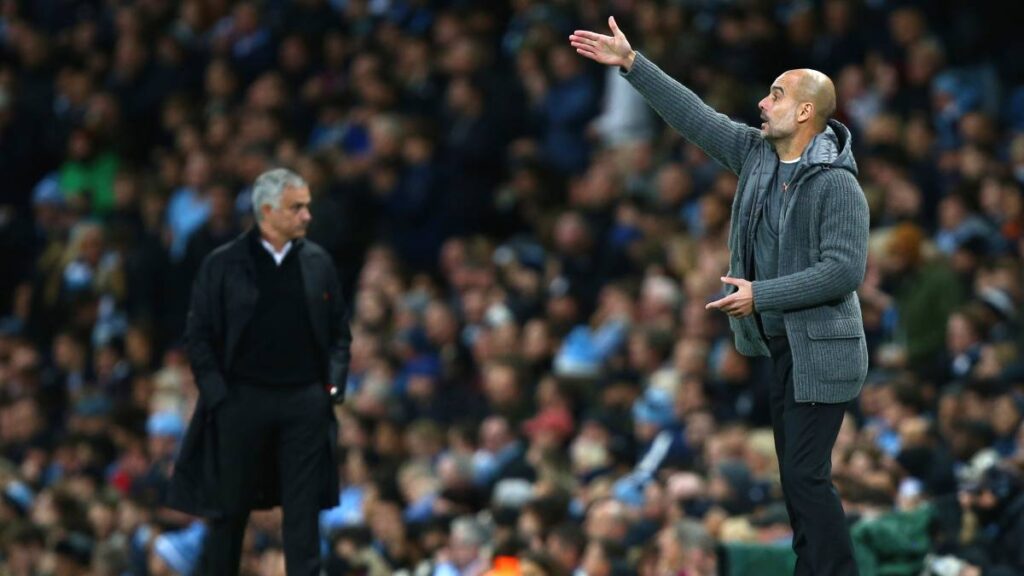 Guardiola y Mourinho calentaban los ánimos en el Clásico de España. AP