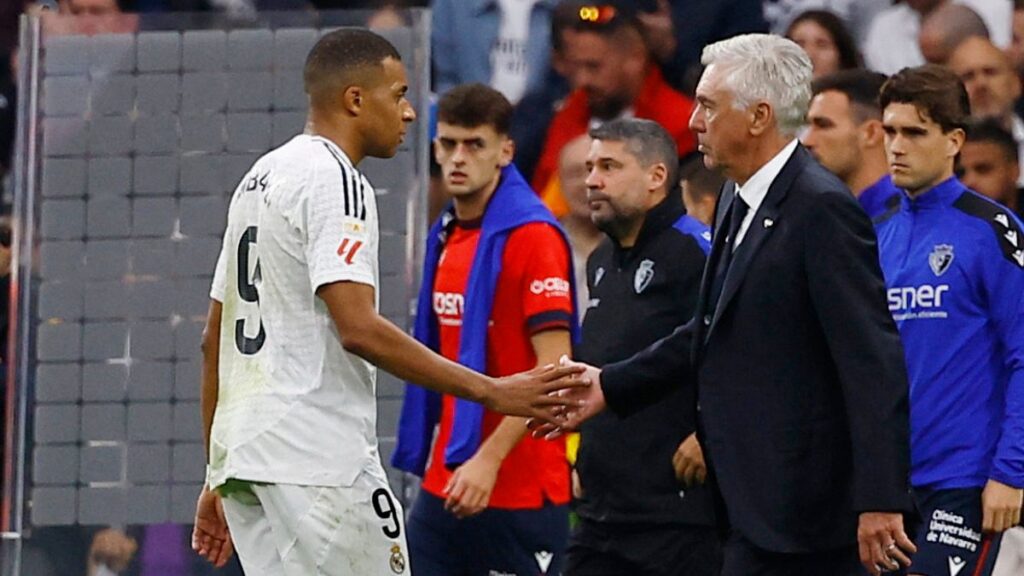 Kylian Mbappé con Carlo Ancelotti