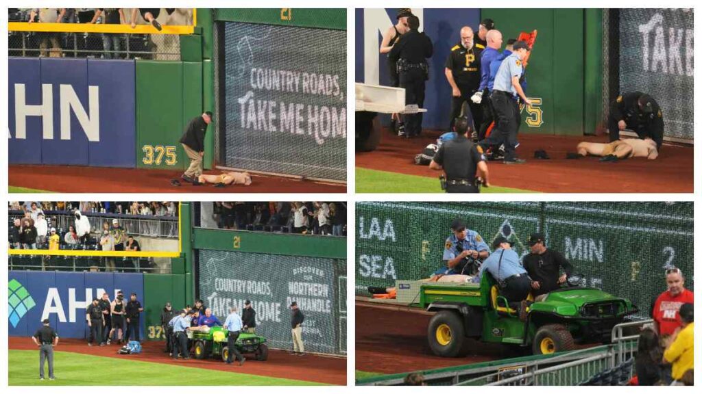 Un aficionado cae del muro Clemente en el duelo entre Piratas y Cubs. AP